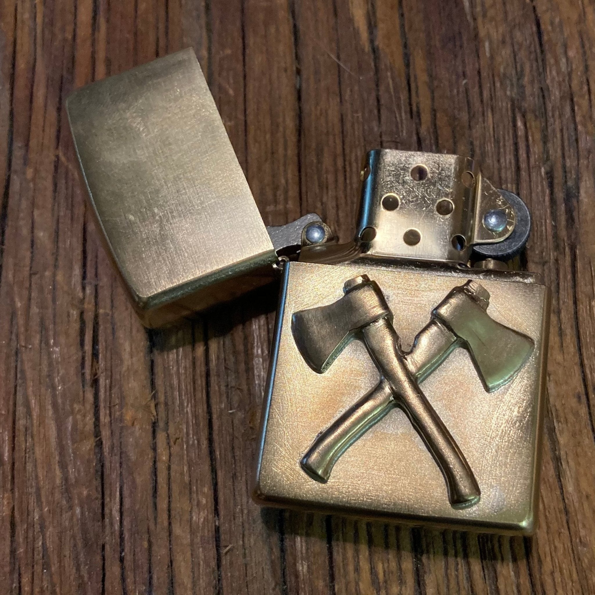 Bijoux finsZippo Axes BronzeBriquetBritish Parts Lucerne