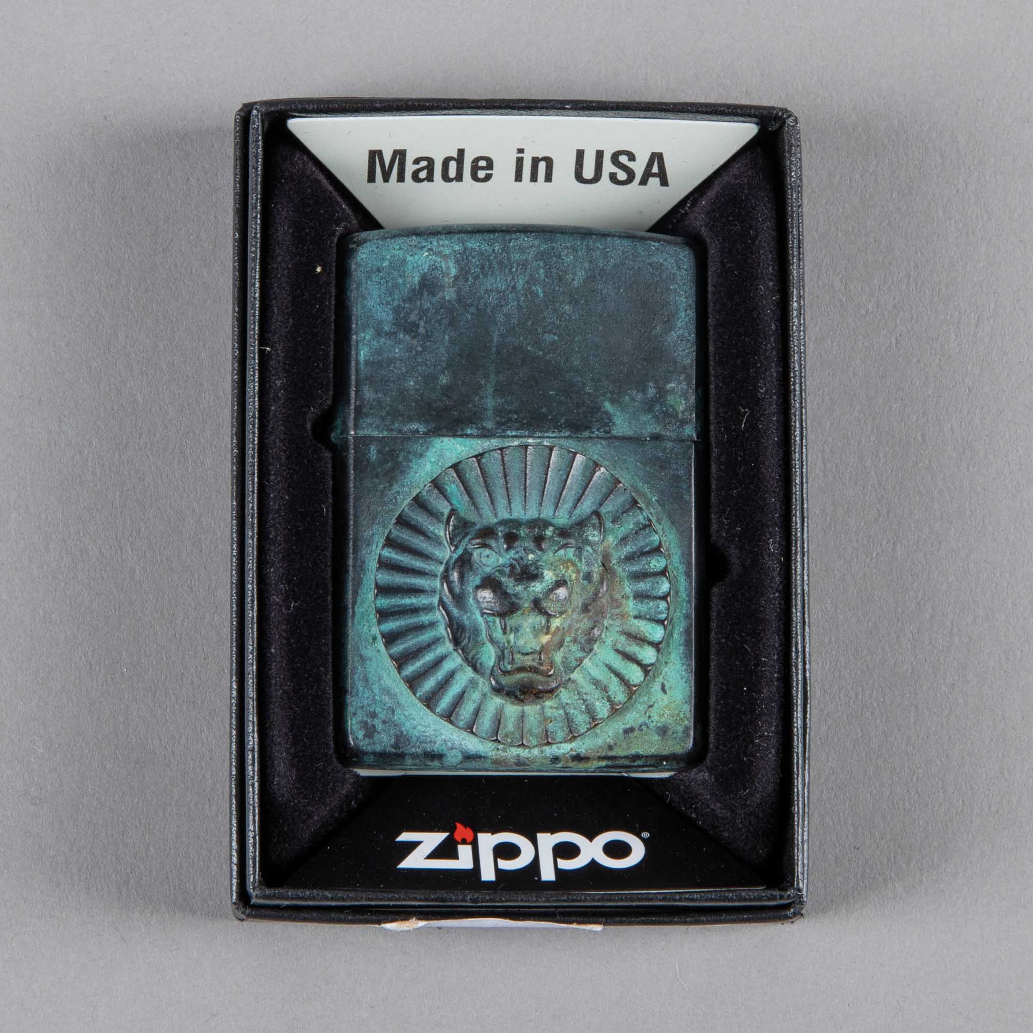 Bijoux finsZippo Jaguar bronze patinéBriquetBritish Parts Luzern