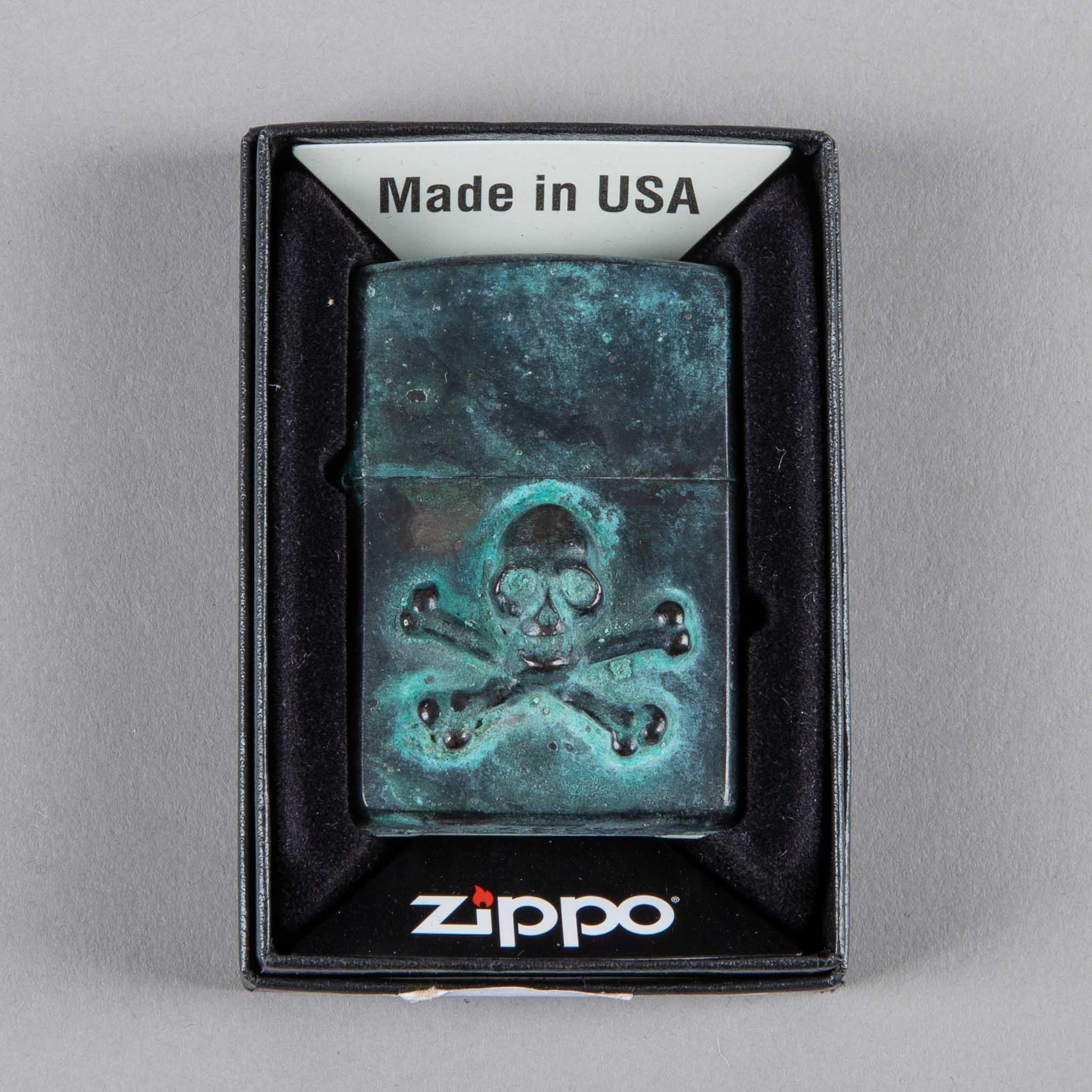 Bijoux finsZippo Skull Bronze patinéBriquetBritish Parts Luzern