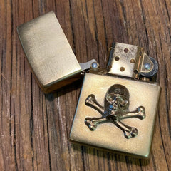 Bijoux finsZippo Skull BronzeBriquetBritish Parts Lucerne