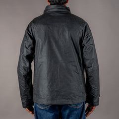 Manifattura CeccarelliVeste de trekking en wax noirVestesBritish Parts Lucerne