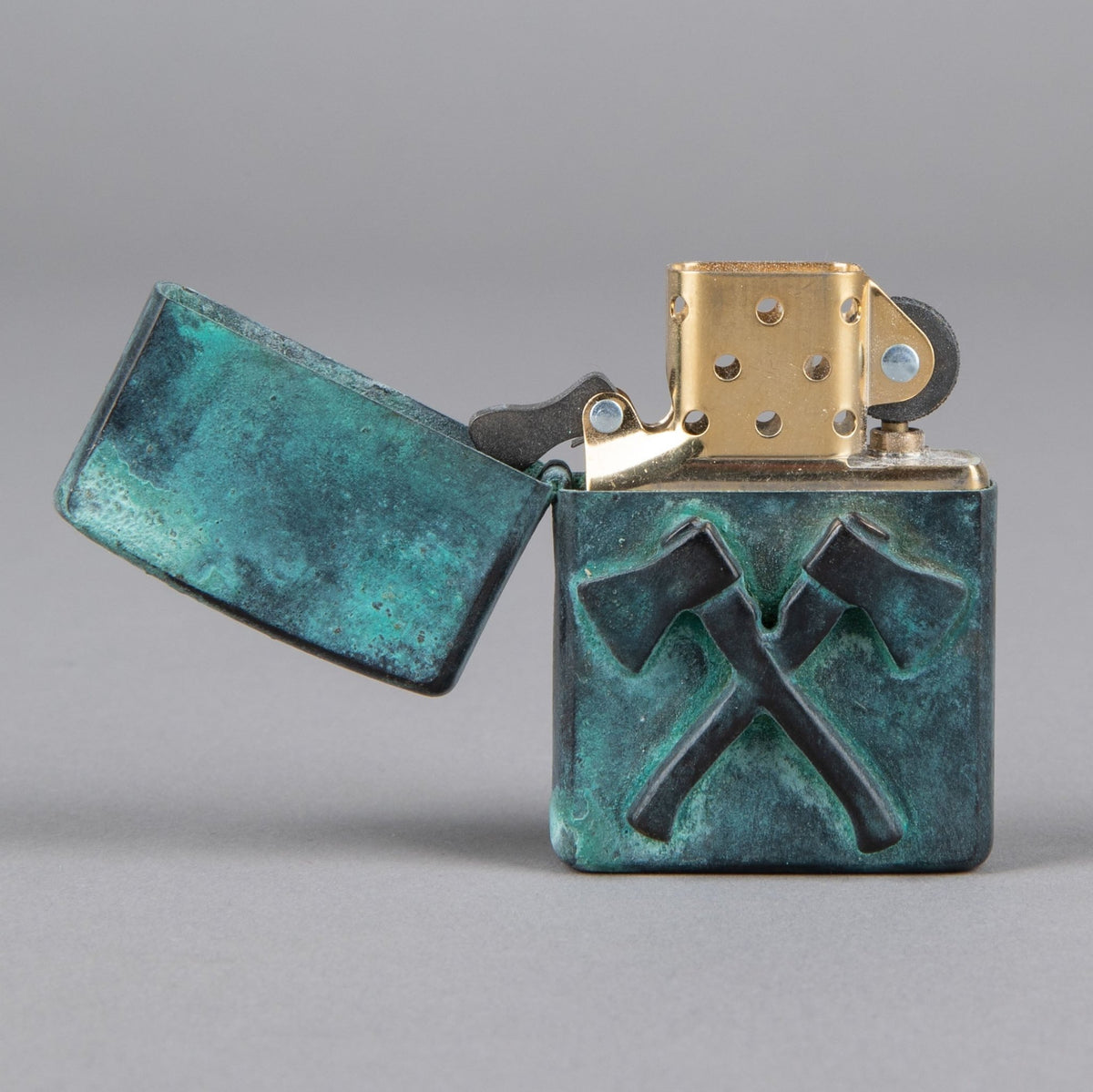 Bijoux finsZippo Axes bronze patinéBriquetBritish Parts Lucerne