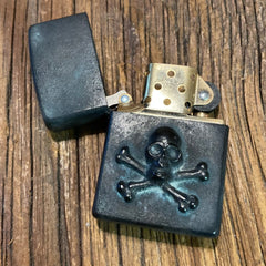 Bijoux finsZippo Skull Bronze patinéBriquetBritish Parts Luzern